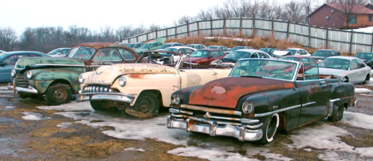 The Mopar drop-tops range from 1946-’48 Town and Countrys to this early-1950s De Soto and Chrysler duo (above) through the finned era, beyond this 1955 De Soto convertible (below).