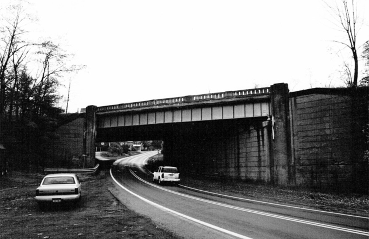 Westernmost portion of the bypassed Ray's Hill/Sideling Hill section of the Pennsylvania Turnpike, crossing U.S. 30 east of Breezewood, PA. In exchange for $1, the abandoned roadway and its two tunnels was presented to the Southern Alleghenies Conservancy for use as a bike and walking path.