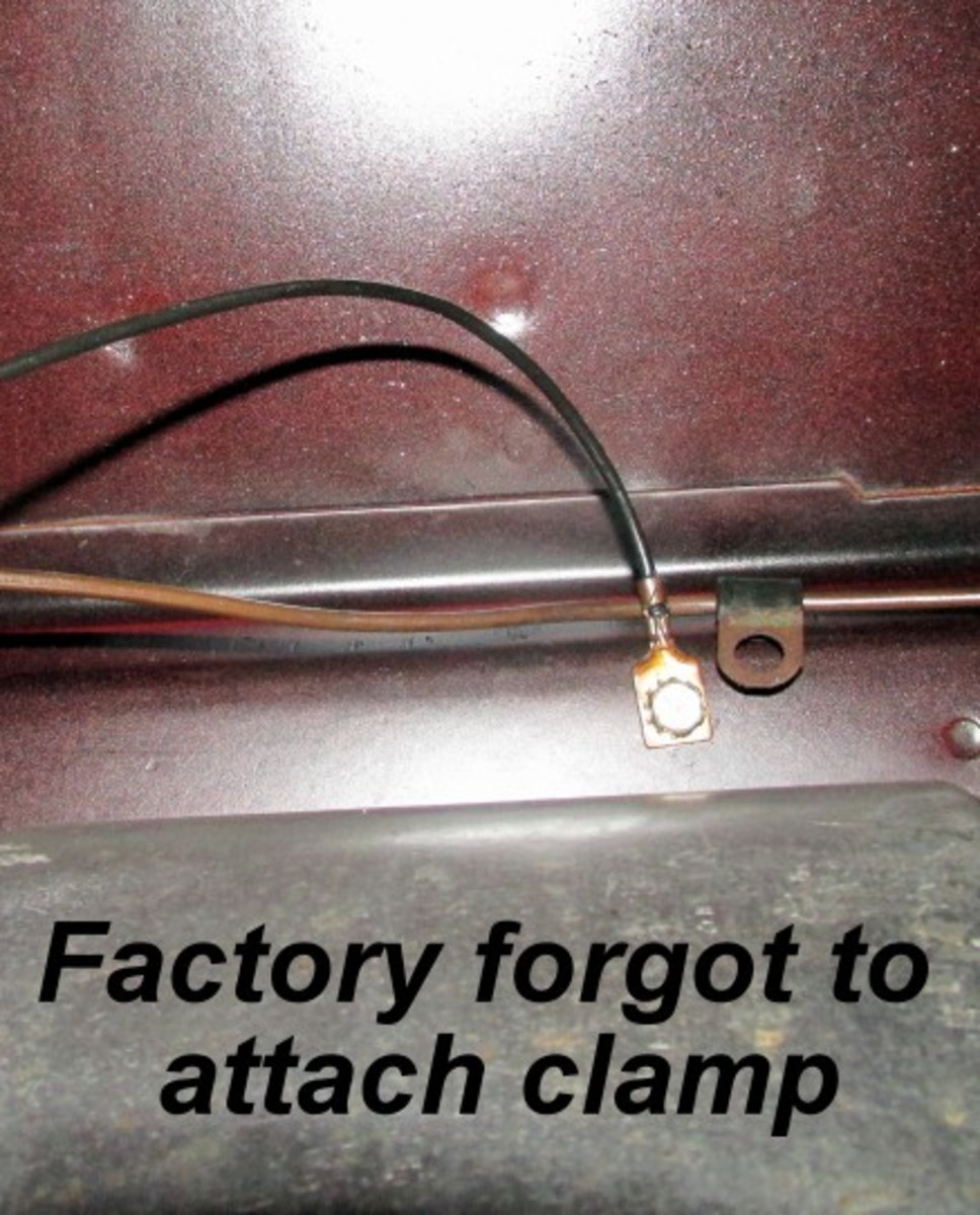 The factory wasn't perfect; here, a clamp was not attached through the bolt also used to secure a wire.