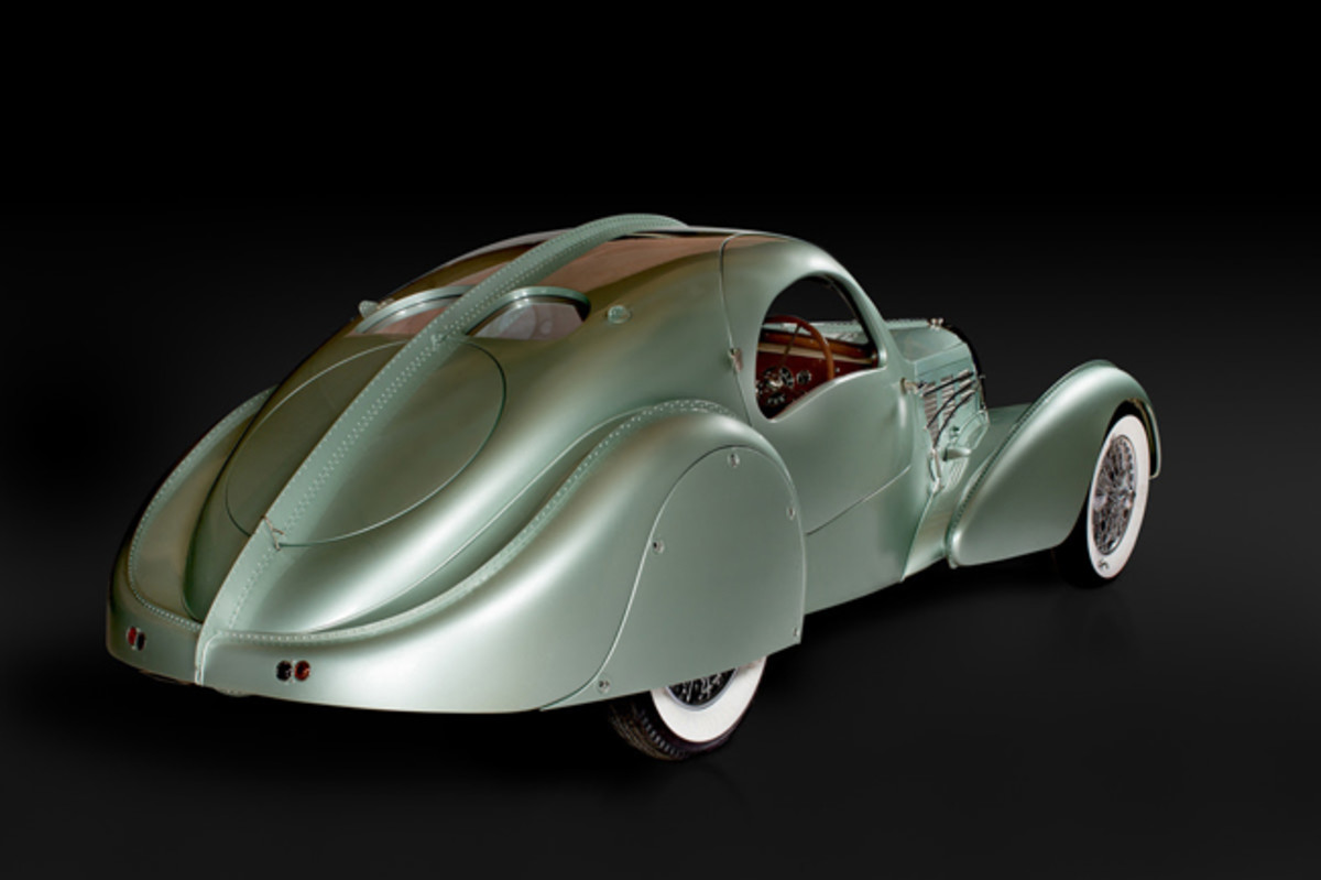  Bugatti, Type 57 Aérolithe, 1935.Photo: Joe Wiecha. (Courtesy of Chris Ohrstrom)Designed by Jean Bugatti, the Aérolithe (French for Meteorite) was arguably the most outrageous automobile of the mid-1930’s and the star of the 1935 London and Paris Auto Salons. Created to announce Bugatti’s modern new Type 57, the avante-garde coupe was sensually curvaceous, with a flowing sculptural body that was in marked contrast the era’s square-rigged competitors. After touring the continental show circuit, the one-off Aérolithe disappeared. This is an exact re-creation on the earliest known Type 57 chassis.