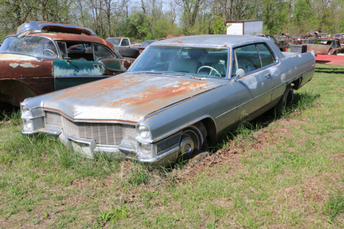  This 1965 Cadillac is jacked up in the back so a buyer could check out the frame and undercarriage for rust. It has factory air and is for sale as a unit only.
