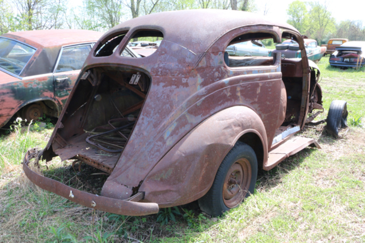  This ’37 Plymouth two-door looks to be a street rod project gone bad. It has late-model bucket seats and a chopped top that was cut and partially welded back.