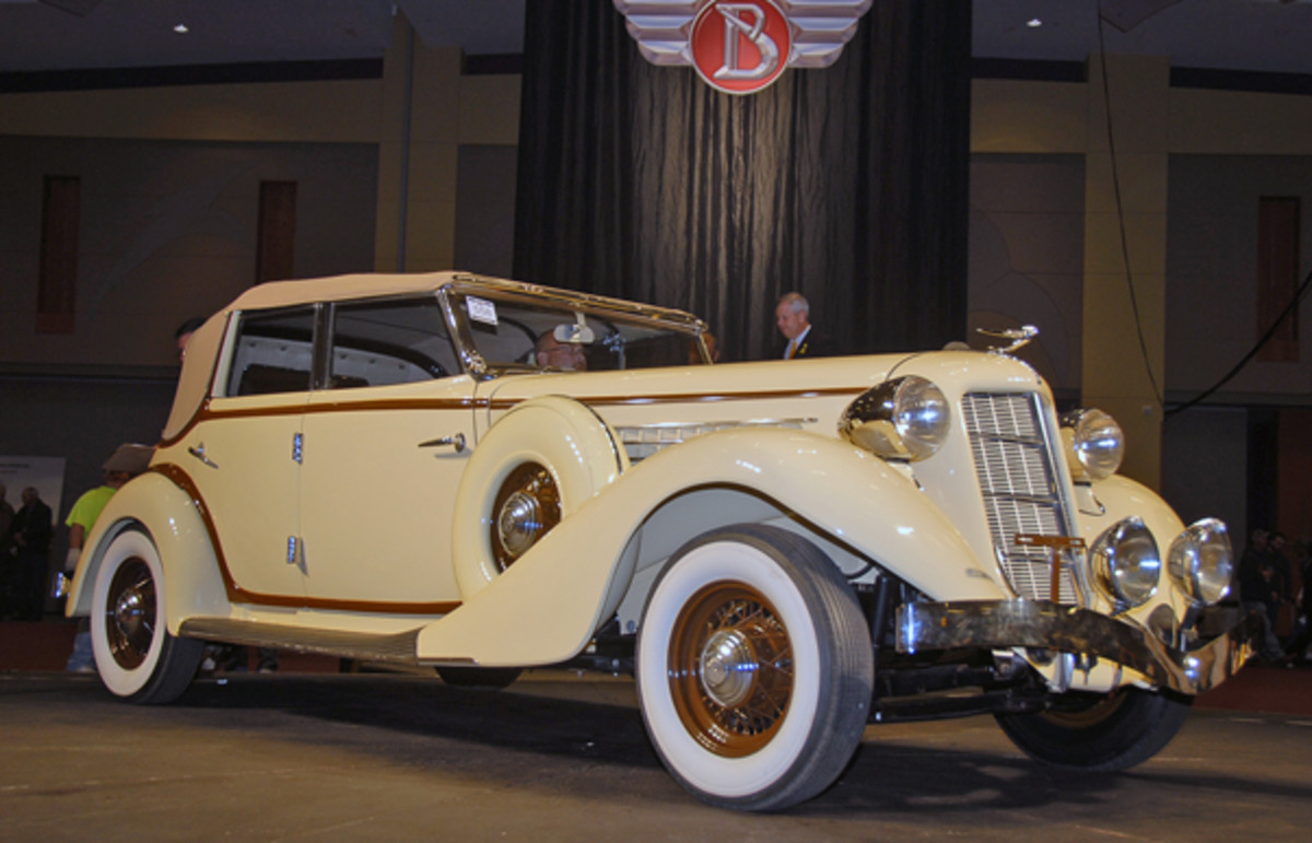 The top-selling car at the fall Branson Auction was this 1936 Auburn 852 Phaeton Sedan, called sold at $97,000.