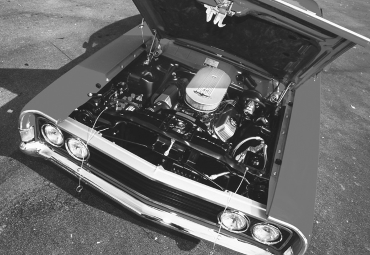 The big 428-cid V-8 was one of several engine designs Ford offered in 1969, and filled out the engine bay of the car. Additions include the external oil filter, mandated by Hooker headers and the dealer-sold intake and carburetors.