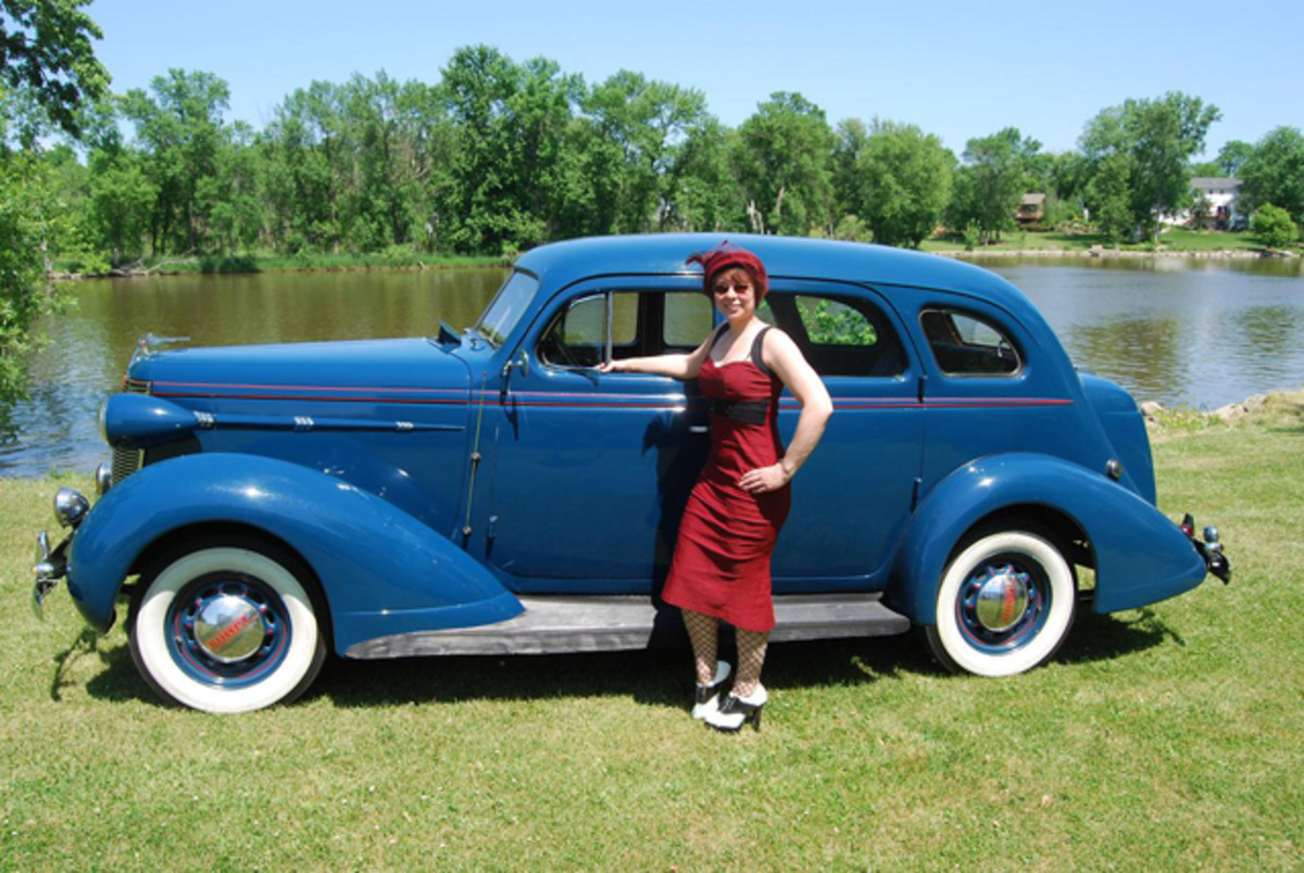 Ann Marie Olson likes to wear hats and period dress when she drives “Walt” to car shows like Mike Spangler’s “Graduation Party.” 