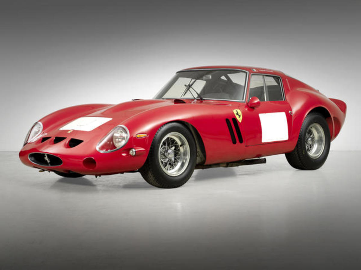 Ferrari 250 GTO achieved $38,115,000, setting a new world auction record at Bonhams Quail Lodge Sale.