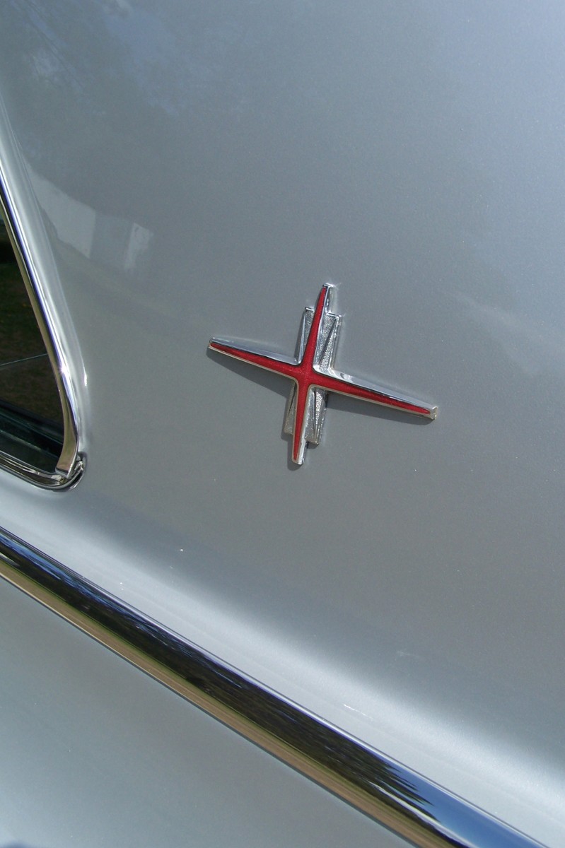 The sail panel (C pillar) Starfire emblem of the 1964 model.