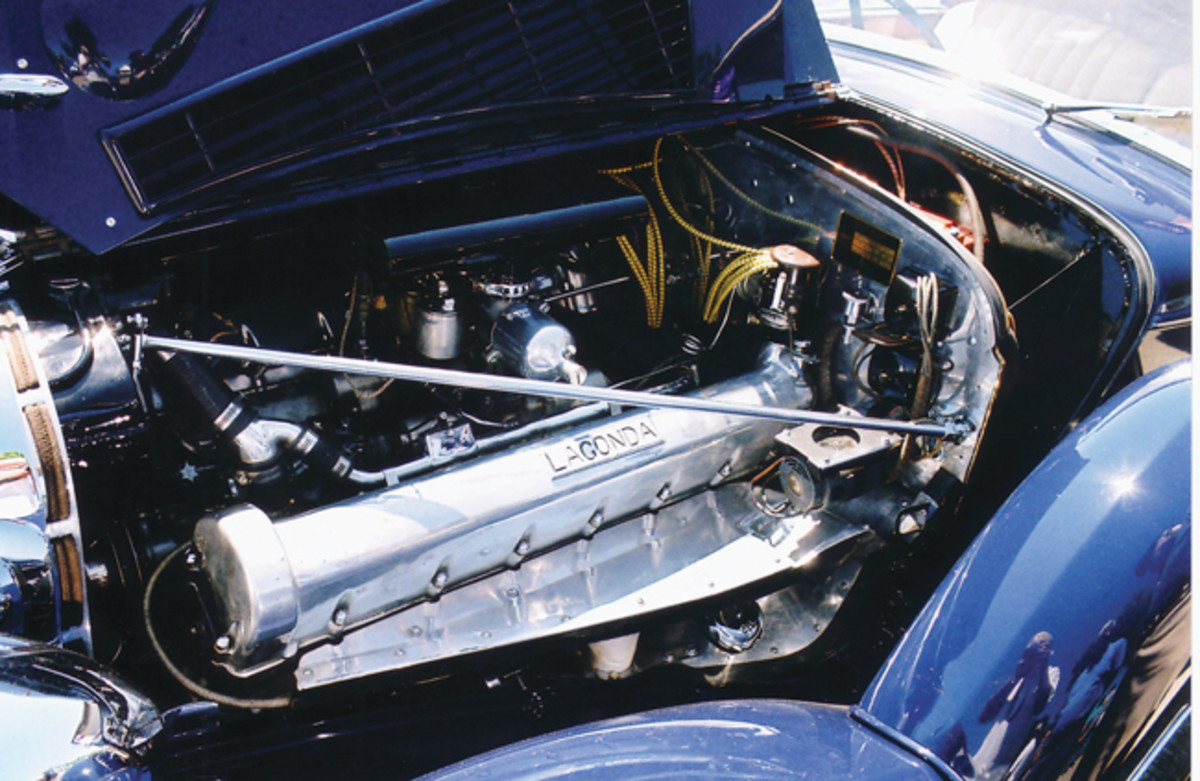 The strong-running V-12 features two overhead cams, two fuel pumps and two ignition systems. Its S. U. carburetors have been polished to a jewel-like luster.