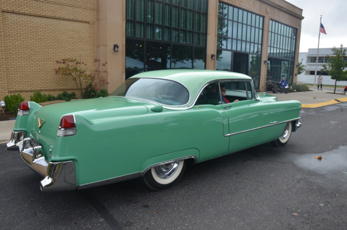 Spectators could get rides in vintage Cadillacs during the Saturday concours. Kids and adults alike rode in the passenger seat of this 1955 Coupe deVille.
