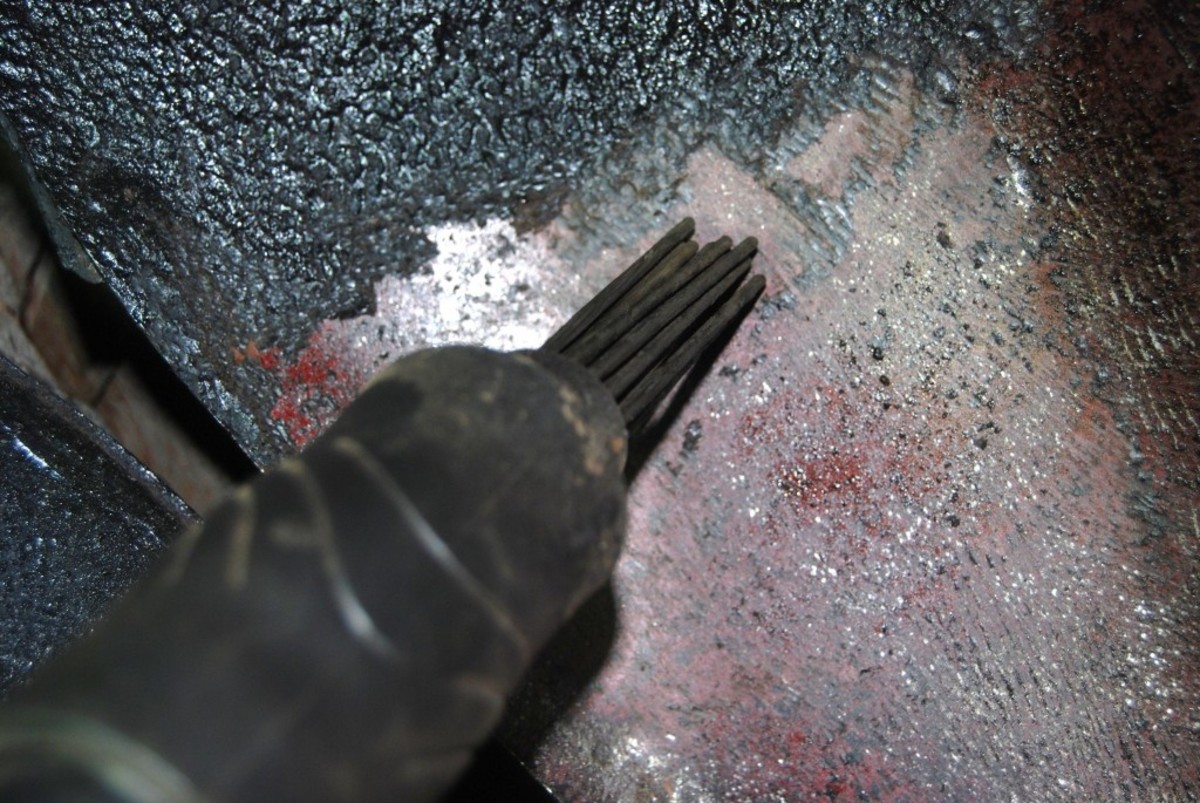 An anvil inside the tool slaps the tentacle like needles against the undercoating and the pounding, vibration and heat take the undercoat off.