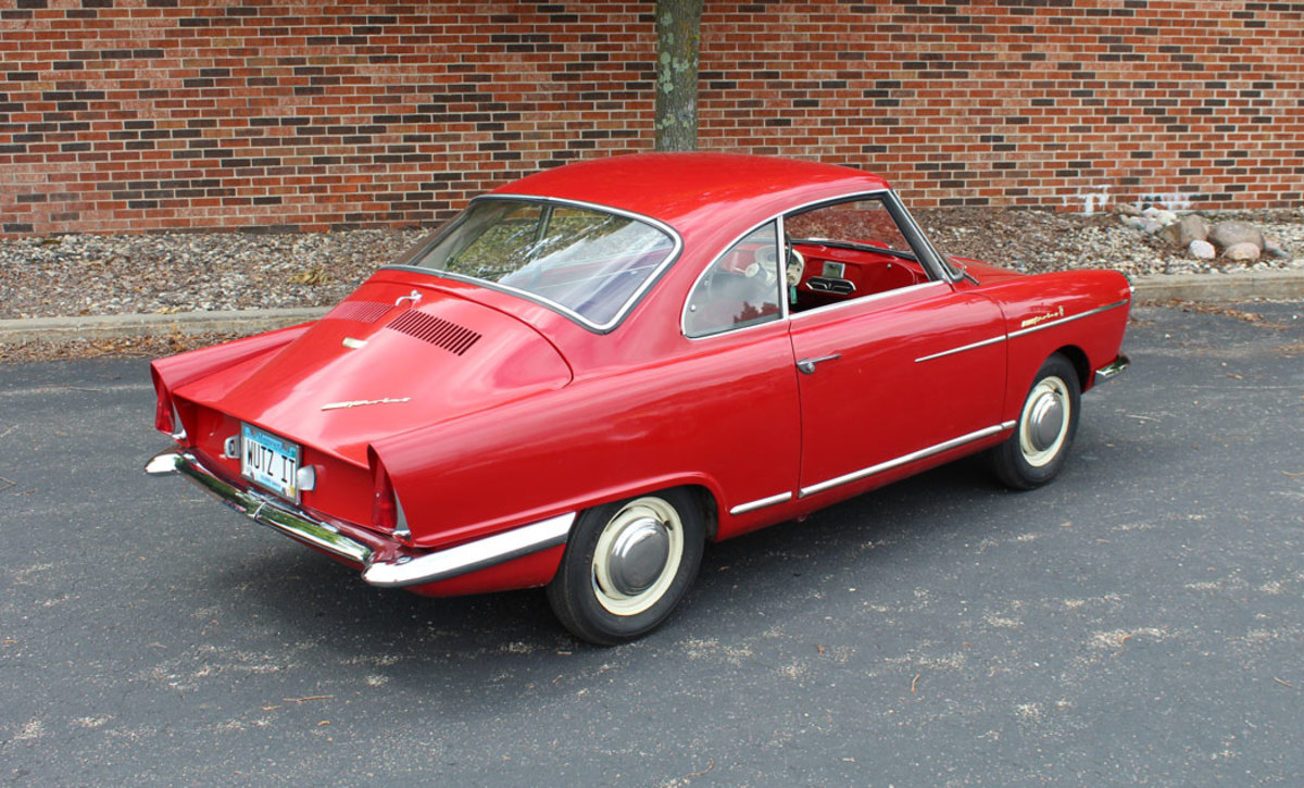 A look of the Nuccio Bertone styling was much different than that of the sedans and featured a fastback profile with tailfins, a raked wraparound windshield and back window, triangular rear quarter windows and wind-down windows.