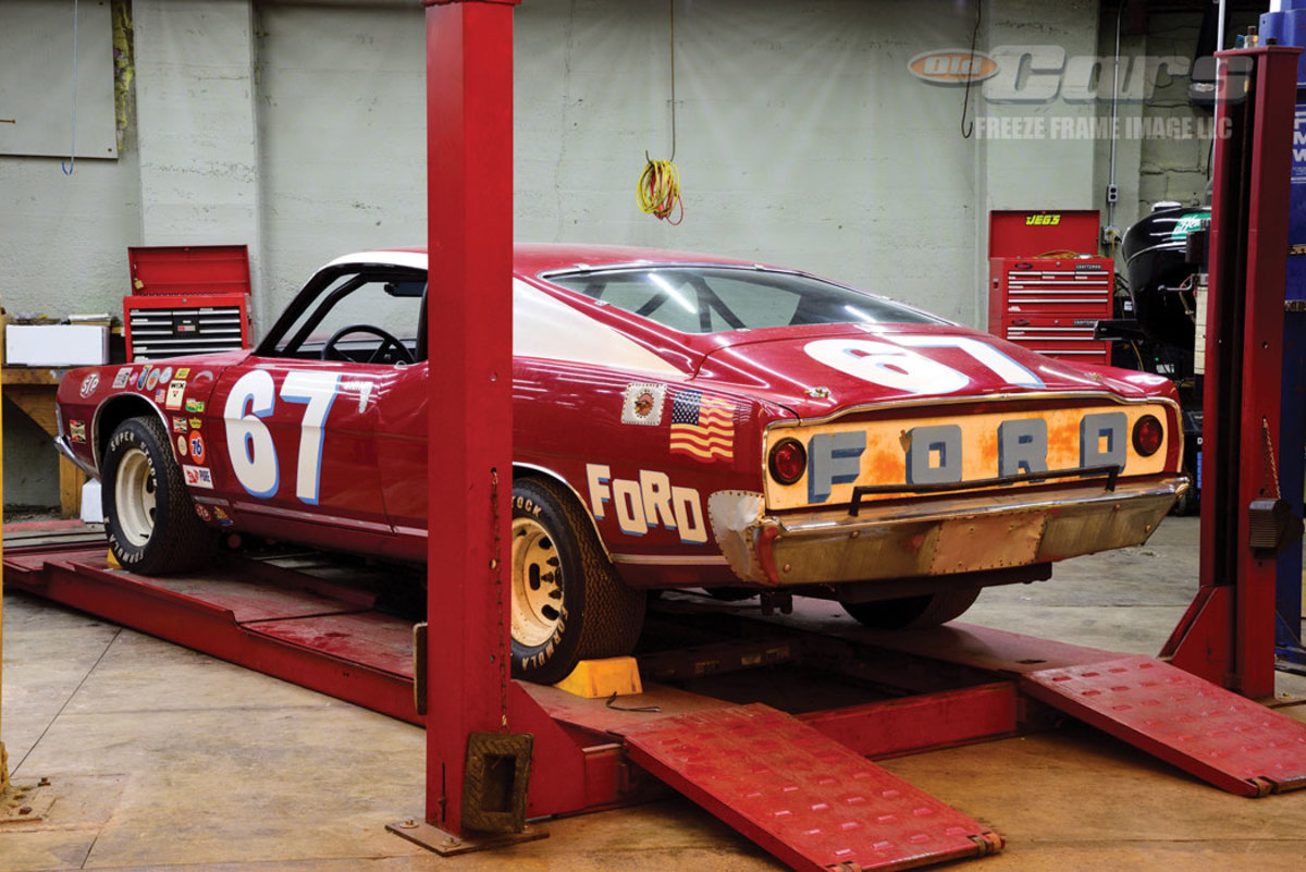 1969 Ford Torino race car is readied for service on the four-post lift at the NATMUS Garage in Auburn, Ind.