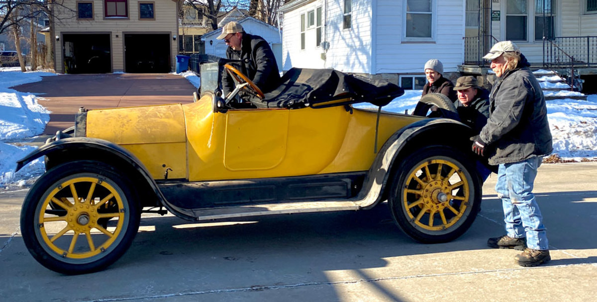 The 1915 Overland, aka “the yellow car,” as it was delivered to Steinberg. Mark Buttles, pictured at back and closest to the camera, led Steinberg to the cars.