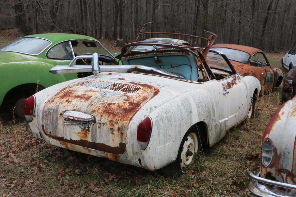 The engine is gone from this early-’70s Karmann-Ghia convertible. The bumpers have been pulled off and thrown into the passenger area, along with various other pieces, including parts of the  convertible top. This car might not be restorable, but it’s got quite a few pieces that could be  useful on other cars