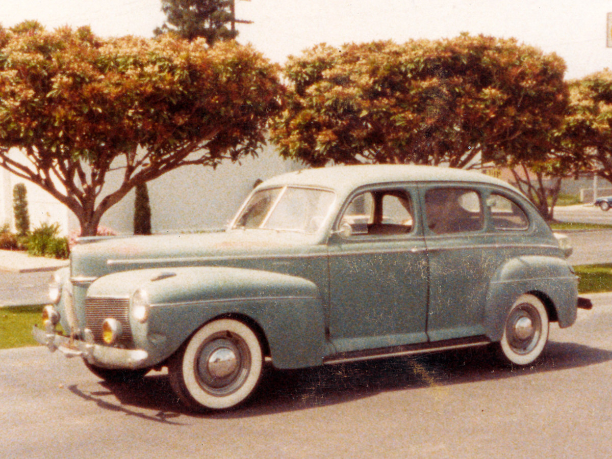 The 1941 Mercury as it arrived at the wrecking yard in 1970, and as pictured in early ’83. The car was cherry, but not exactly Great American Race-ready. Here it’s about to be scattered for restoration.