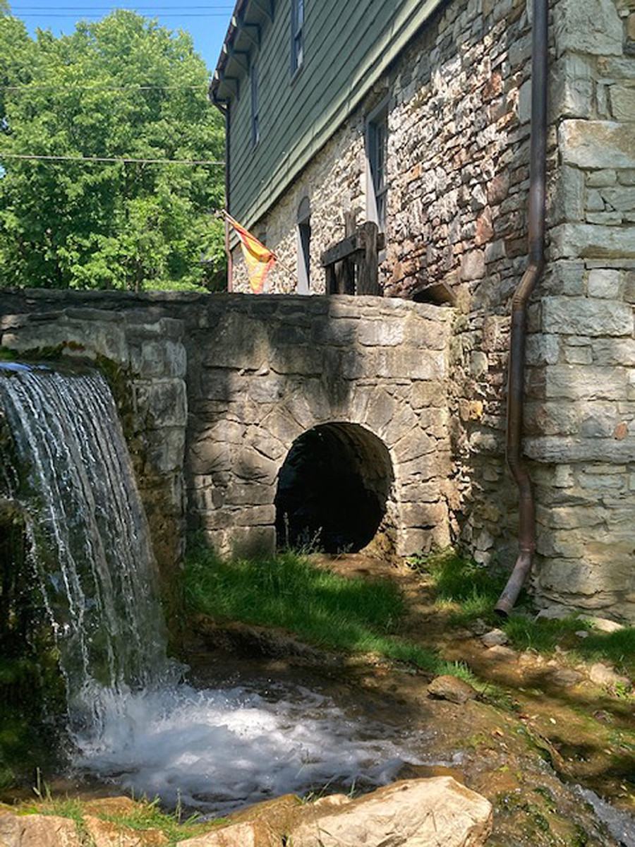 The Burwell-Morgan Mill with millrace at left.