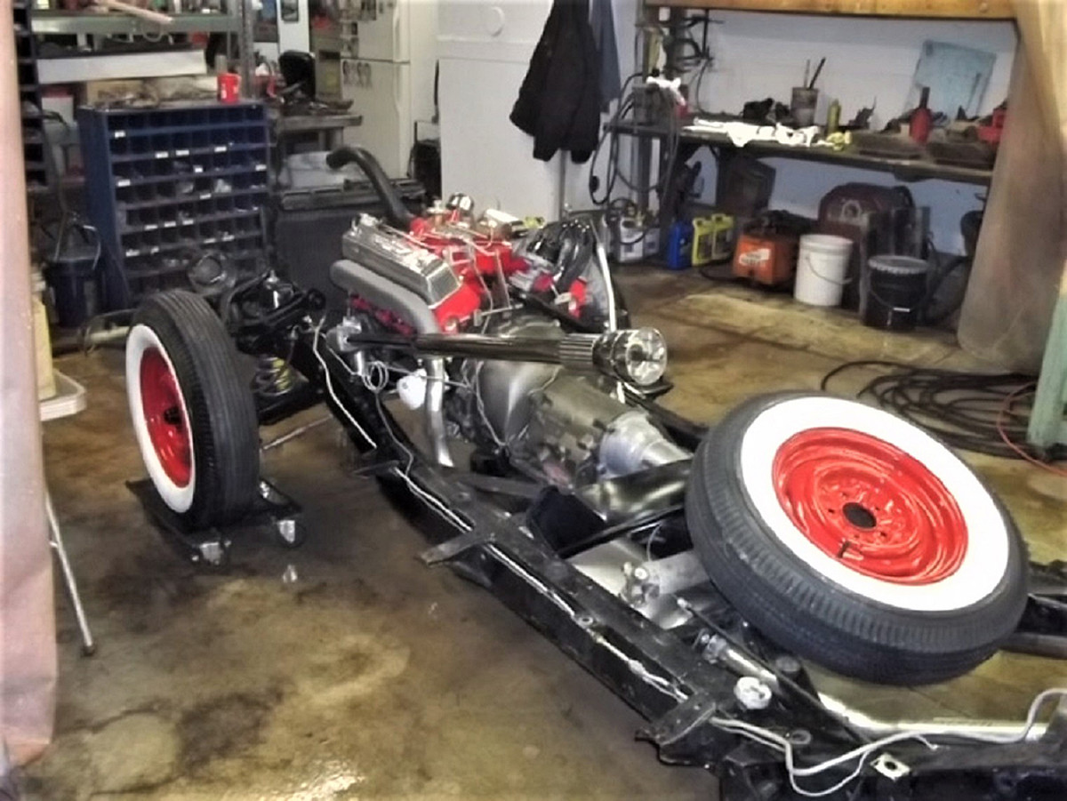 Restoring the car was done in a two-car garage starting with a T-Bird body and buckets of parts and pieces.