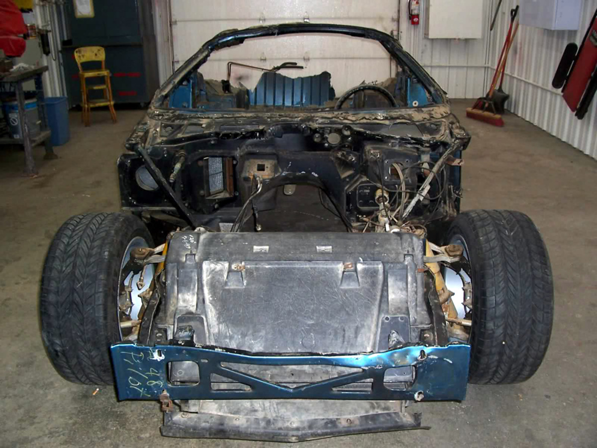Here is how EX-5023 appeared with the damaged body panels removed and ready to go to the frame shop.