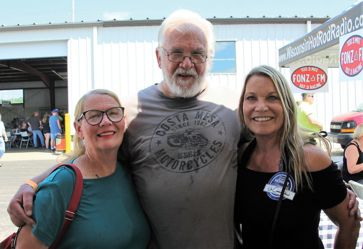 Auto writer Linda Clark (left) and former Old Cars Editor John Gunnell (center) met celebrity guest Jo Coddington at the 2018 Iola Old Car Show.