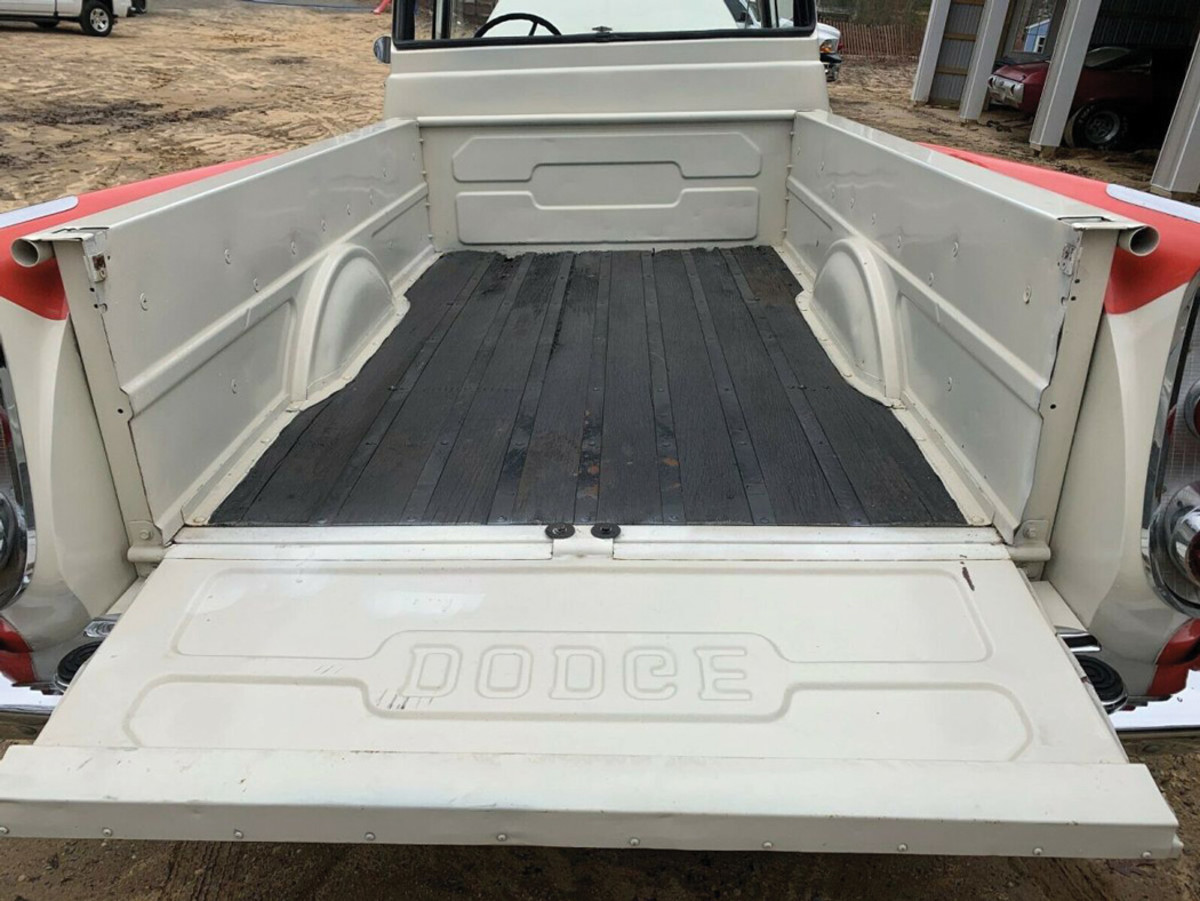 In 1957, wooden floor boards were painted black on a Dodge truck.