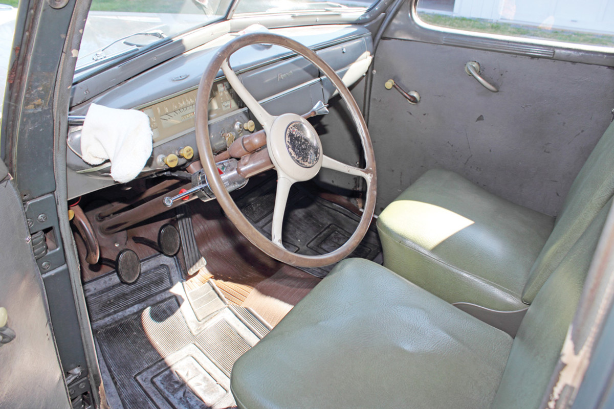 Steering wheel shows normal wear after 80 years.