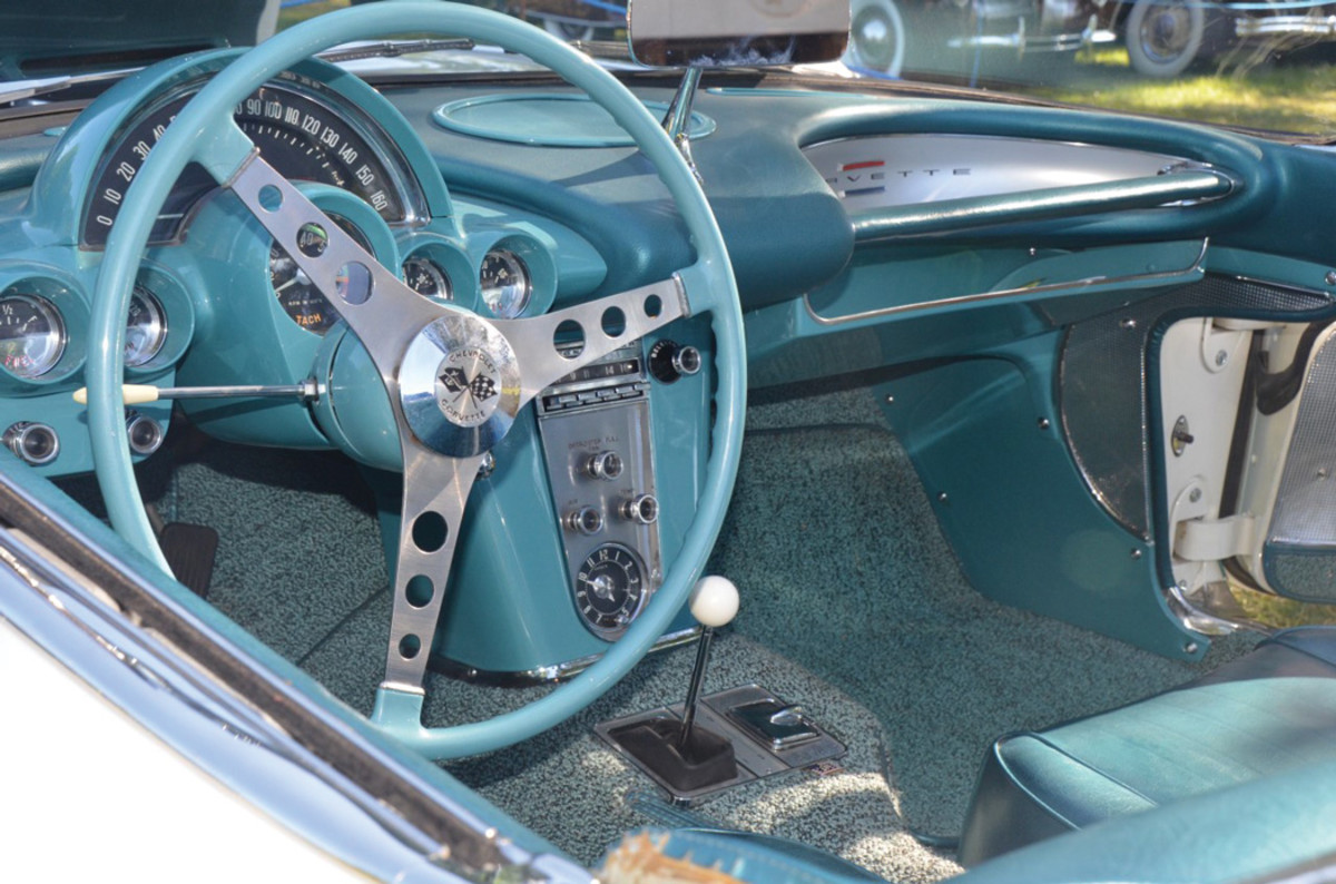 The 1960 Corvette’s turquoise interior matches its Tasco Turquoise cove, both of which contrast the car’s Ermine White exterior.