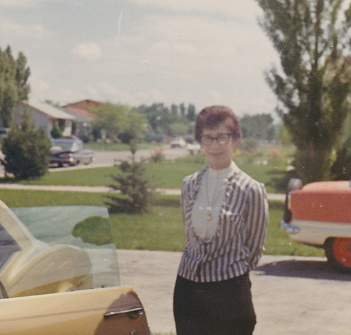 Grandma Betty and Jenny the Camaro back in the late 60's.