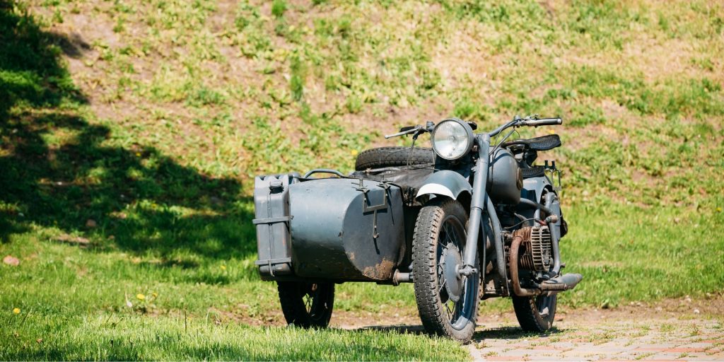 Rarity Three-Wheeled Motorcycle With Sidecar Of German Forces Of World War 2 Time As Exhibit In Park