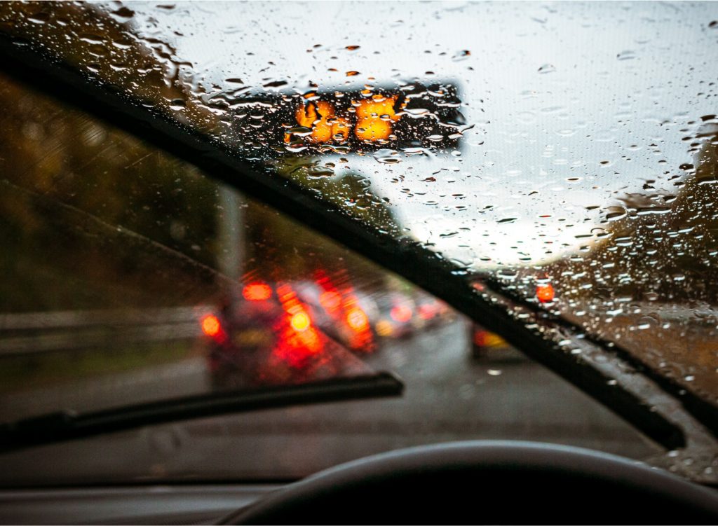 Car windshield on a rainy day