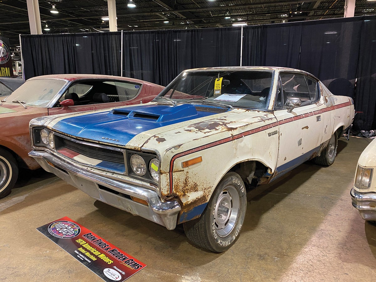 Patriotic until its near-demise, this 1970 AMC Rebel Machine still wears most of its original paint, including its reflective 3M stripe decals. The intermediate-size Rebel Machine packed a unique 340-hp 390 V-8, and although offered in a rainbow of colors, slightly more than half of the 1,936 built had this red, white and blue paint scheme. Fredrick Francises’ survivor retains most, if not all, of the Rebel Machine’s unique components, including the flat, wide hood and special Kelsey-Hayes wheels. Rebel Machines were a joint project between AMC and Hurst. Photo: Angelo Van Bogart