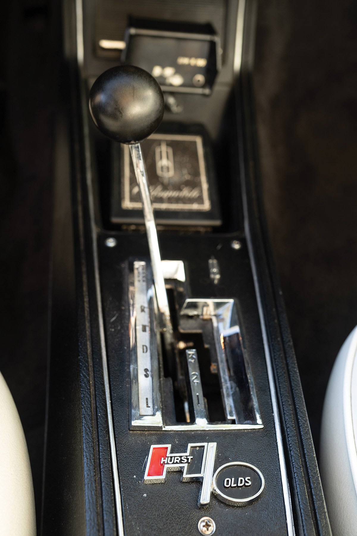 Hurst/Olds emblems abound, including on the console with the Dual-Gate shifter.