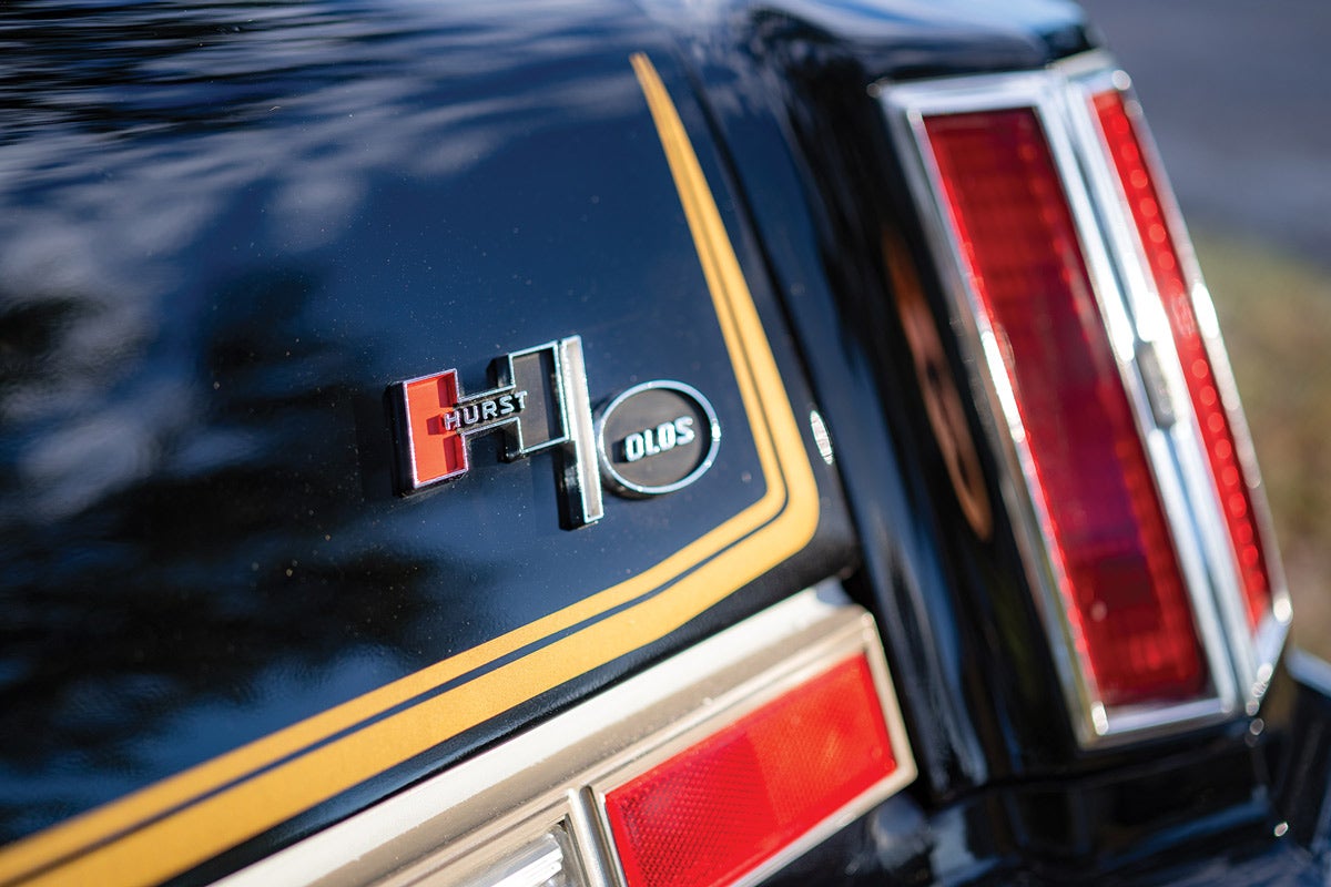 The standard Oldsmobile Cutlass Supreme rear treatment was enhanced by a gold stripe and Hurst/Olds emblem on the rear deck.