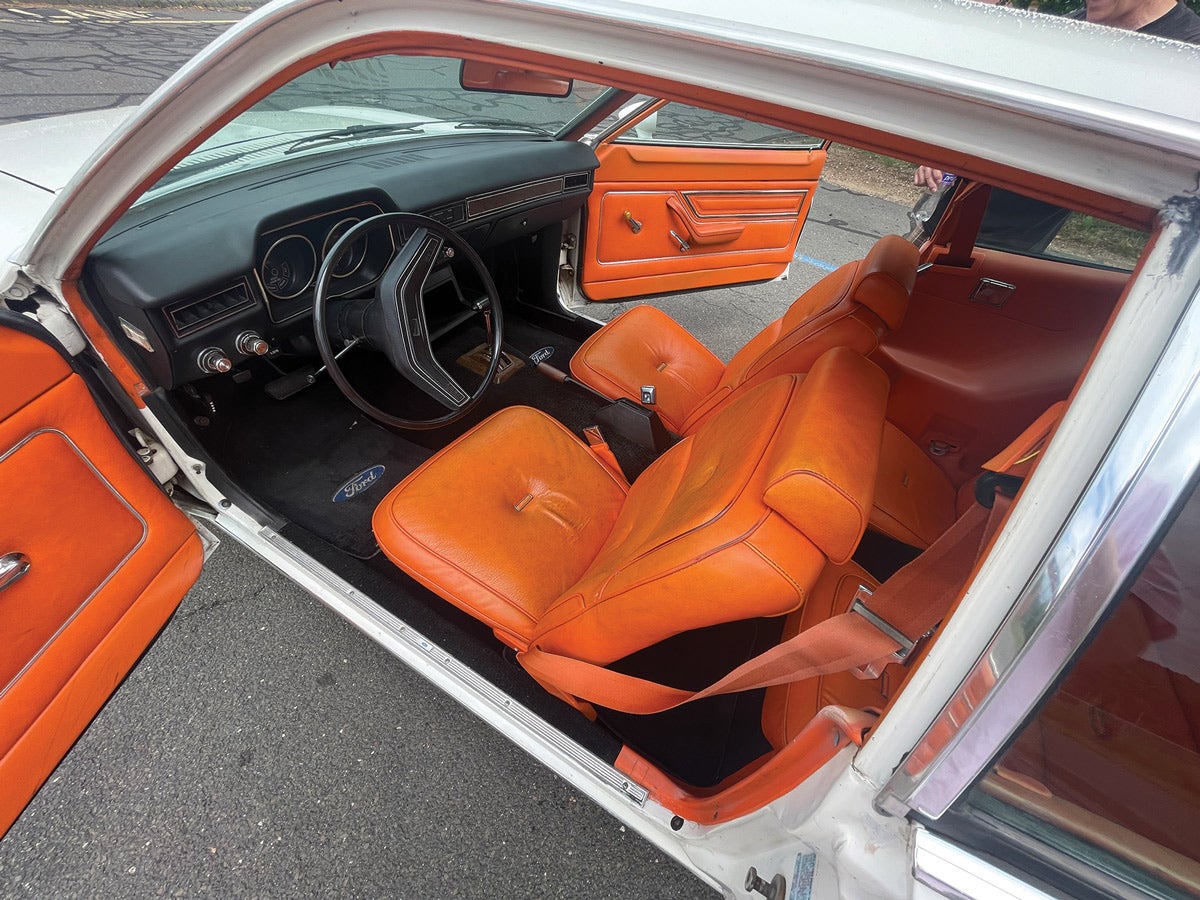 The interior is certainly a big attention-getter in this little Ford! The Tangerine color seats were available only in cars with Polar White or Tangerine exterior paint.