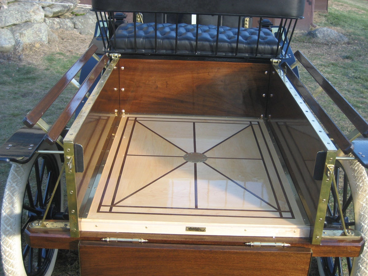 Note the elaborate design in the floor of the Studebaker’s pickup box.