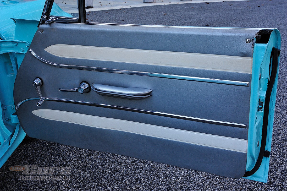 Note the dart motif on the door panel upholstery to mimic the exterior door “dart” trim