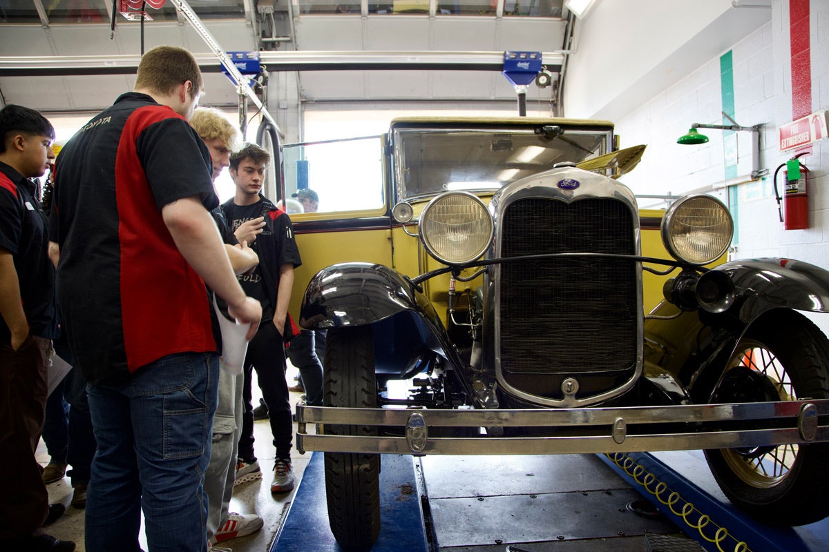 Students in the Automotive Service Technology program at Francis Tuttle Technology Center look at a 1930 Model A Ford Cabrolet brought to them by the OKC Model A Restorers Group on Monday, May 5.