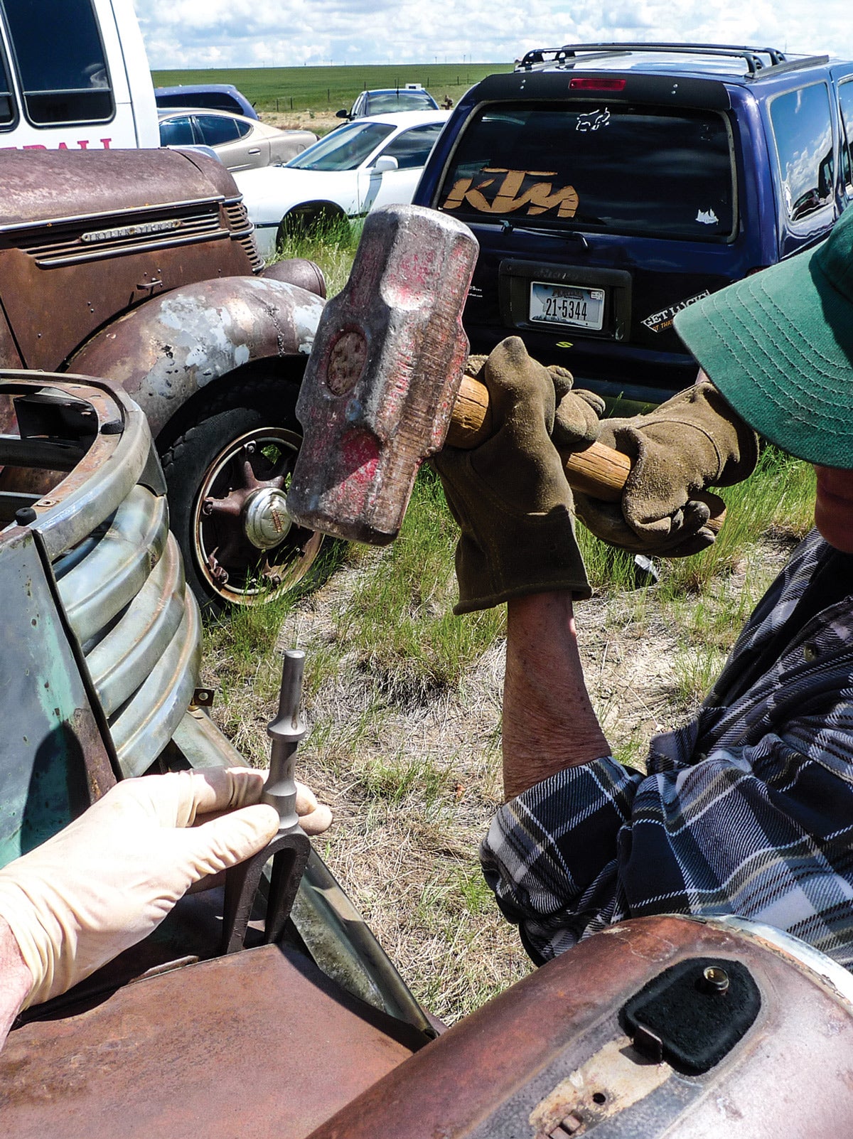 Today we won’t be using wrenches. To access bolt shanks, we’ll need to create a little gap. With a thump from our favorite body hammer, a pickle fork gets us started.