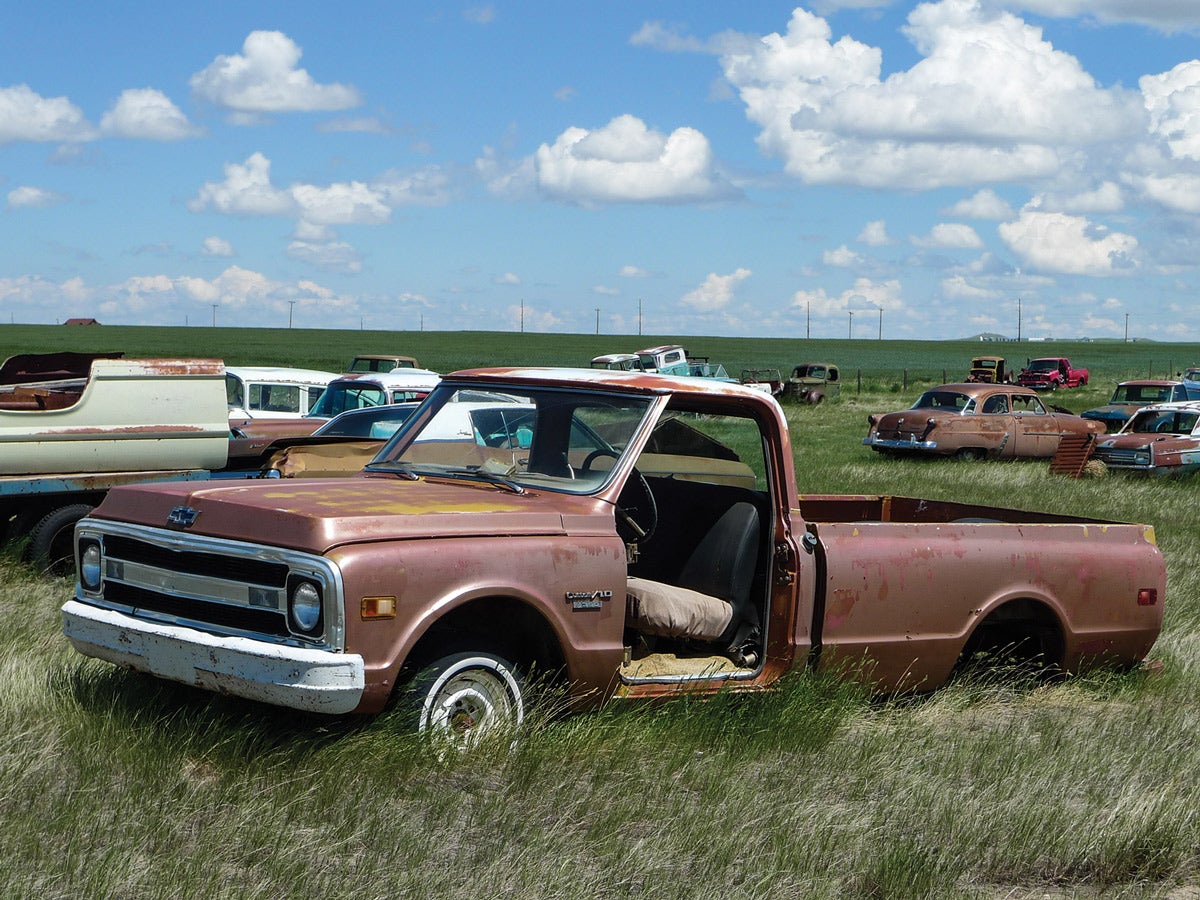 1 This ’70 Chevy has been picked at, but there’s still plenty there. Notice the absence of rust in the lower fender corner? The missing door must’ve been nice.