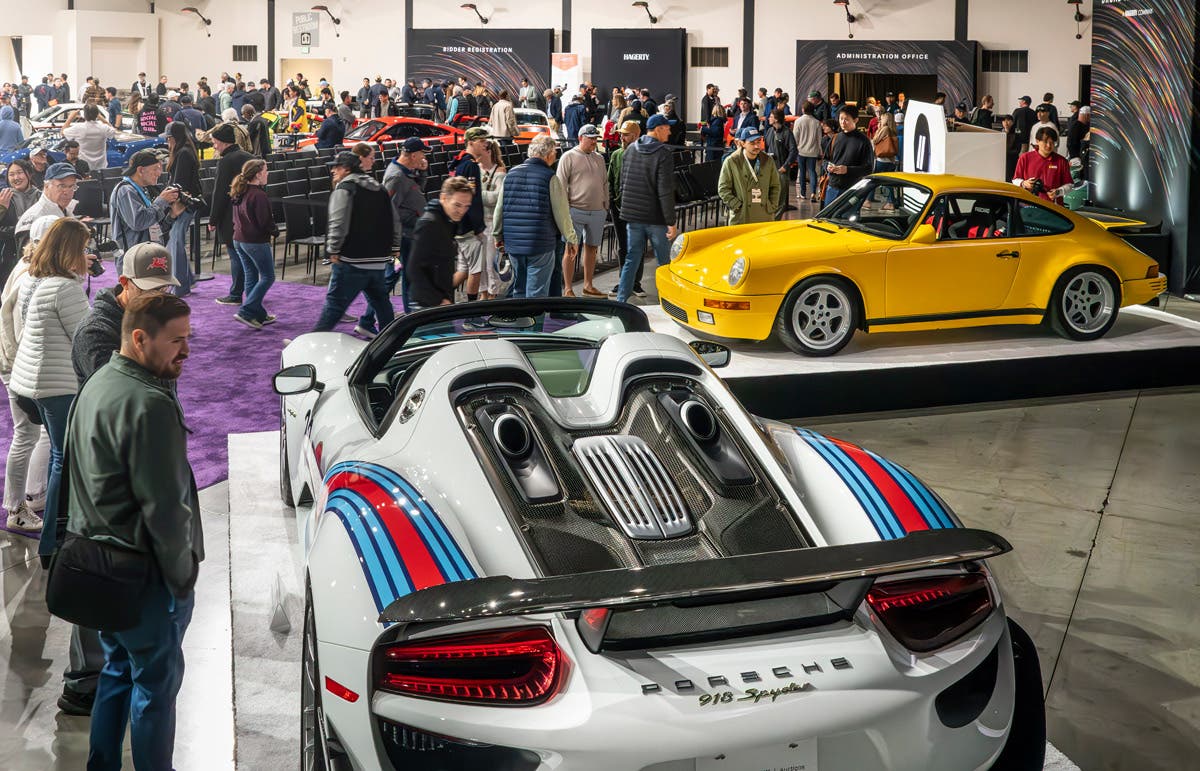 The top-selling RUF CTR Yellowbird and Porsche 918 Spyder Weissach greet attendees at Broad Arrow's 2025 Porsche Air|Water Auction.