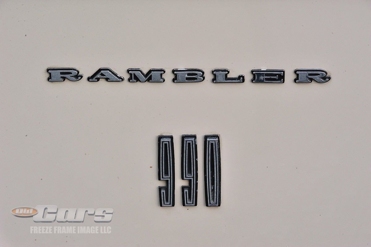 AMC offered two Ambassador models in 1965: the 880 and the higher-trimmed 990. To easily differentiate the models, numerals were mounted on the front fenders.
