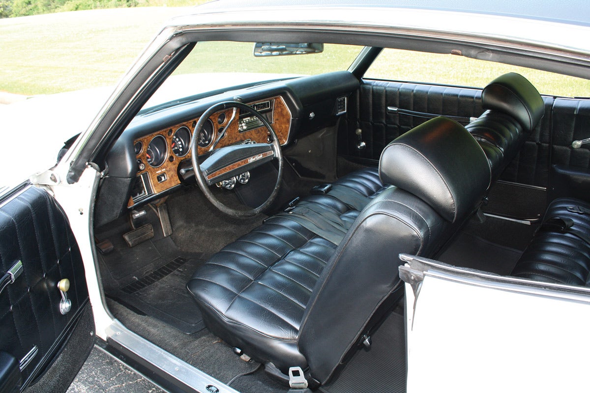 Interior of this Monte Carlo is original. Most features of the interior are like those of the 1971 model. The all-vinyl upholstery option was available in only black, covert (light grayish olive) and saddle.