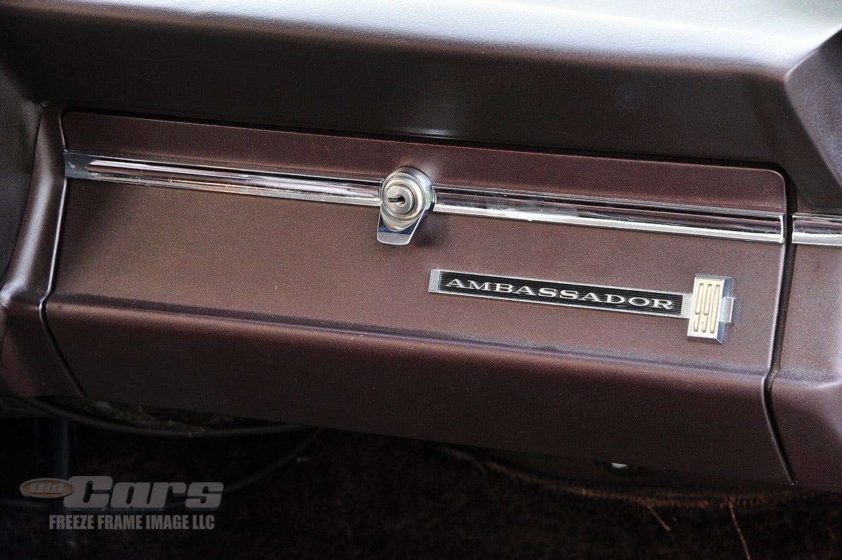 As a reminder to passengers that they’re riding in the top-of-the-line AMC product, an Ambassador 990 badge is mounted to the far right side of the glove box door.