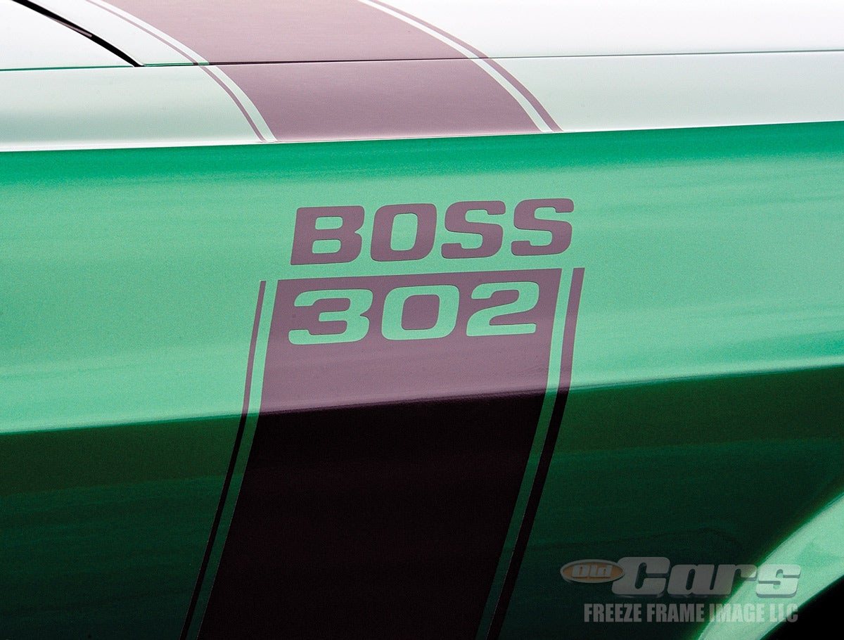 For 1970, the Boss 302 stripes saddled the hood and ran down, along the body sides with the “Boss 302” call outs interrupting the strip high on the front fenders.