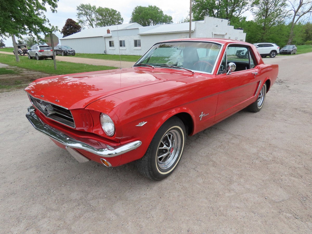 1965 Mustang: 1965 red Ford Mustang, runs and drives, powered by a V8 with 3speed on the console shift, the odometer shows 46,634 miles, black bucket seats, white headliner. AM radio, manual windows.