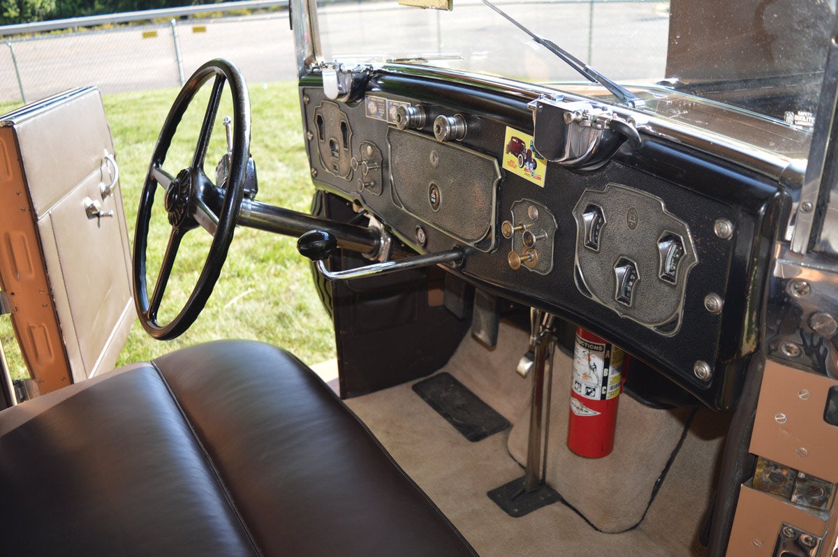Art Deco touches abound on the Cord Front Drive’s instrument panel. Note the shift handle extending out the center, which has a reverse shift pattern from the standard H.