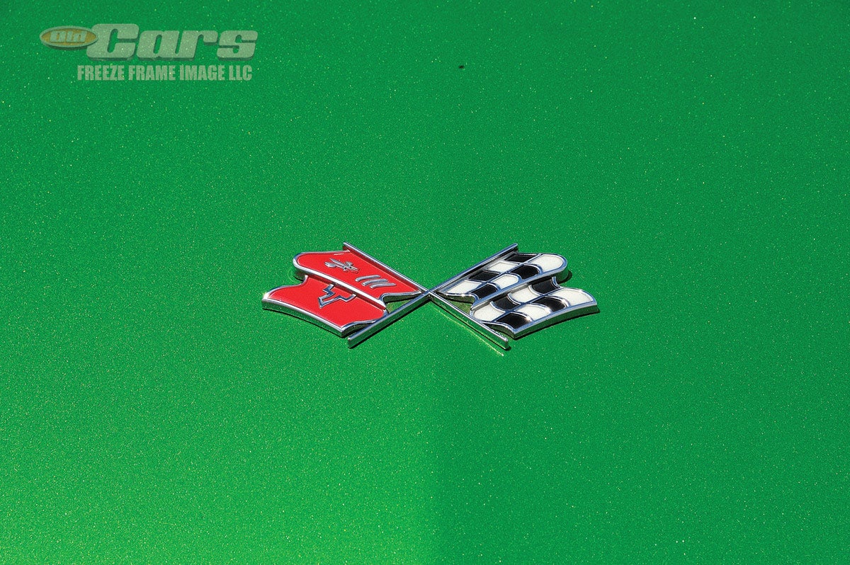 The cross flags really stand out against the custom metallic green paint of Buehrig’s unique 1971 Corvette Stingray coupe.