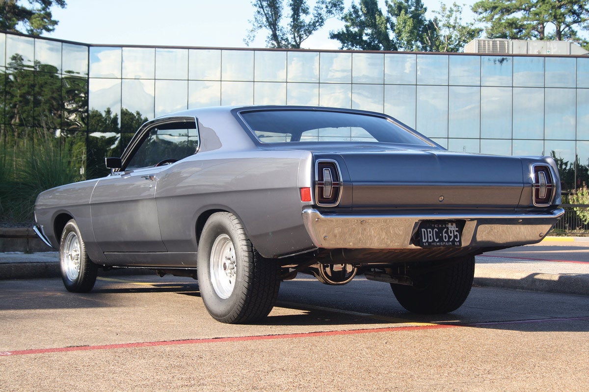The rear view of this 1968 Fairlane 500 shows its aggressive-looking stance. Wheels are Weld 4x15-in. in front fitted with 165R15 Firestone tires and Weld 7x15 with P285/70R 15 BF Goodrich tires in back. The rear wheel openings have been enlarged slightly for more tire clearance. Side trim was removed when the car was repainted in the mid-1970s. Glenn had not planned on owning this car for nearly six decades, did not know it was one of 22 built with the engine/transmission combo, and that it would be a collectible then. Still, it is built exactly the way he wants it.