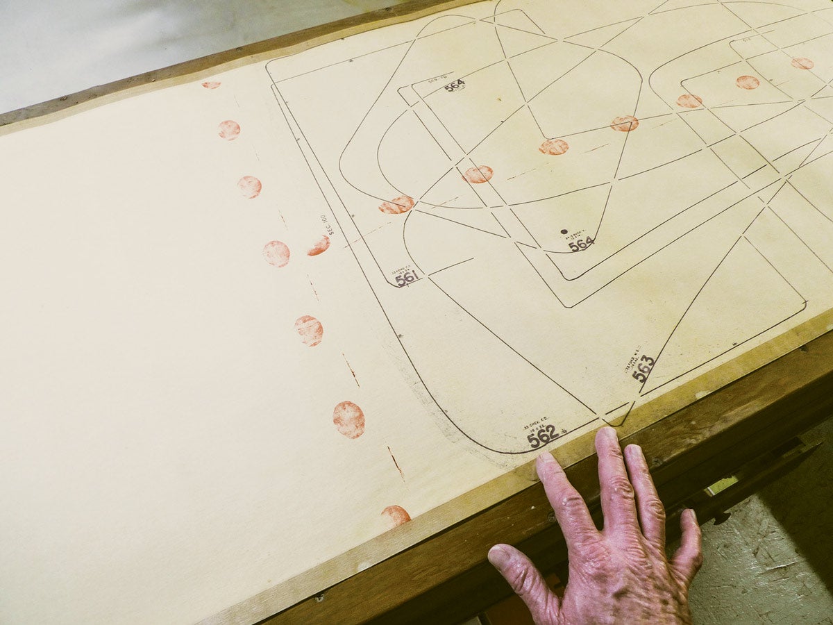 By the book, red spots signal the end of our ledger paper pattern roll, so at the cabinet’s center slot, let’s apply the brake. It’s the best way to avoid unwanted arching.