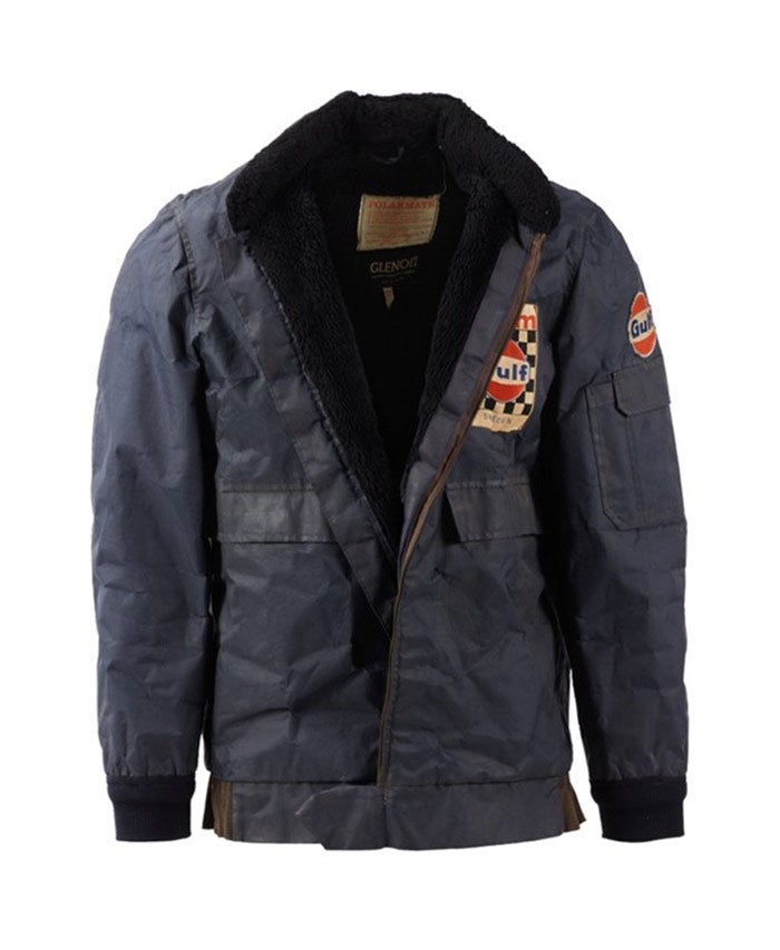 Steve McQueen’s racing lore is his original blue Glenoit brand jacket featuring Two Gulf Oil Team Sweden patches worn in his role as “Michael Delaney” in the 1971 racing masterpiece Le Mans